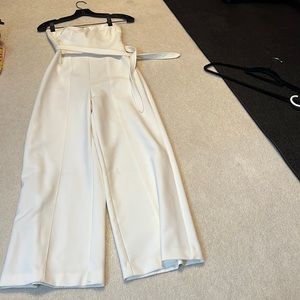 Likely white strapless jumpsuit